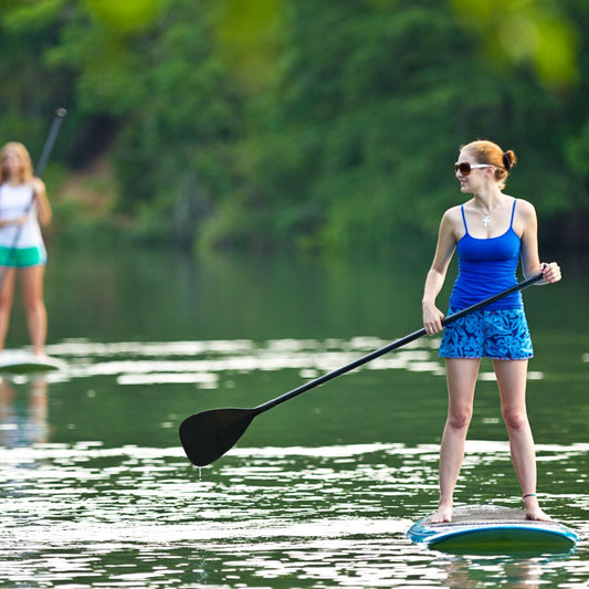 Standup Paddleboarder enjoying time on a lake | SUP&Foil