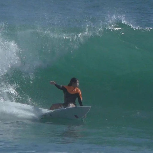 Pro surfer riding NSP board on a big wave | SUP&Foil